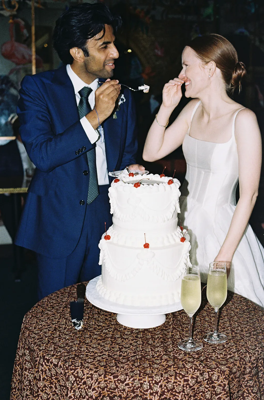 Image may contain People Person Face Head Adult Wedding Cake Dessert Food Wedding Cake and Accessories