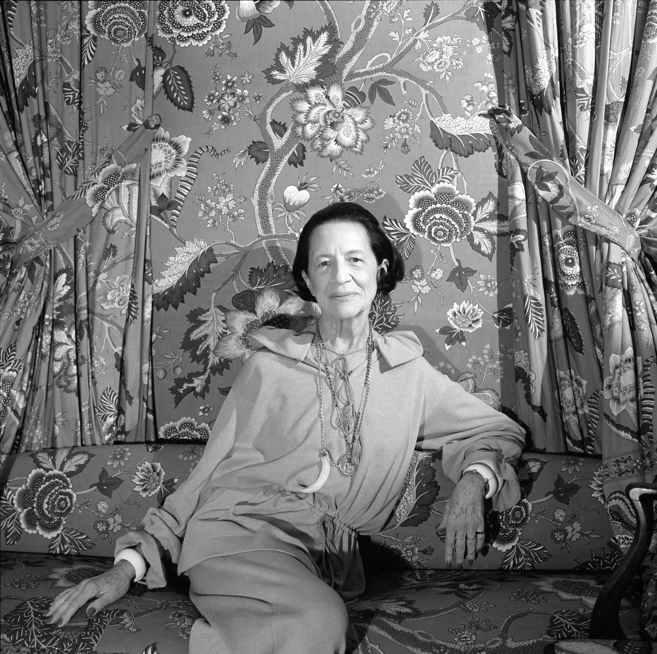 Image may contain Diana Vreeland Face Head Person Photography Portrait Body Part Finger Hand Adult and Accessories