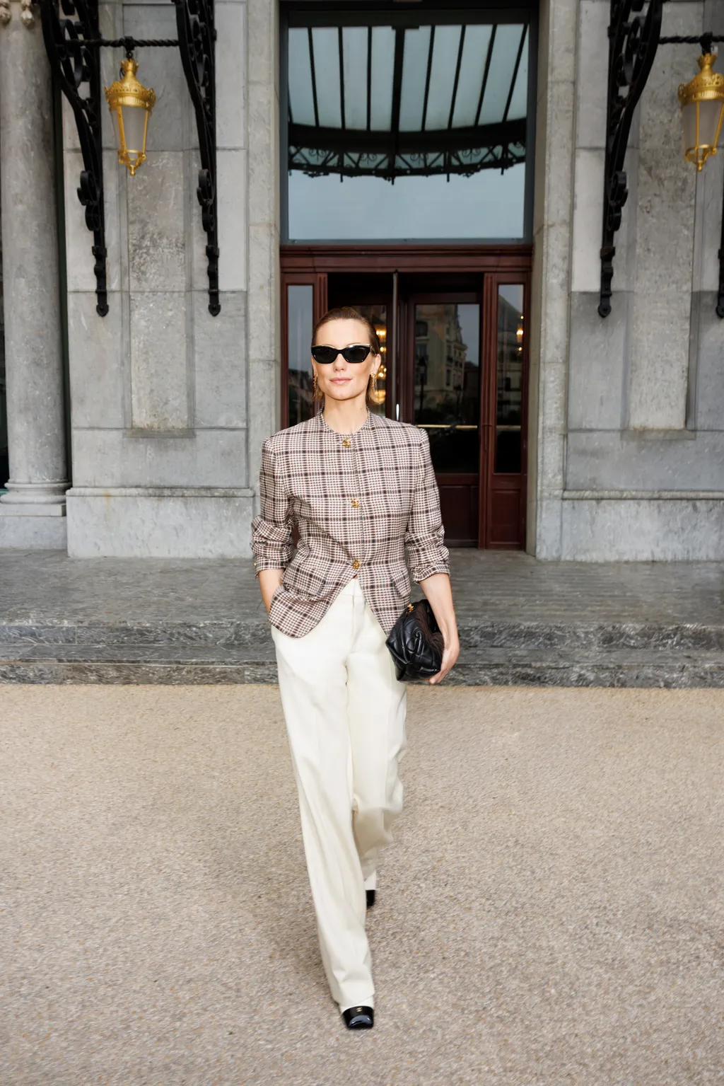 Image may contain Ana Girardot Clothing Pants Sleeve Person Standing Adult Accessories Sunglasses and Glasses