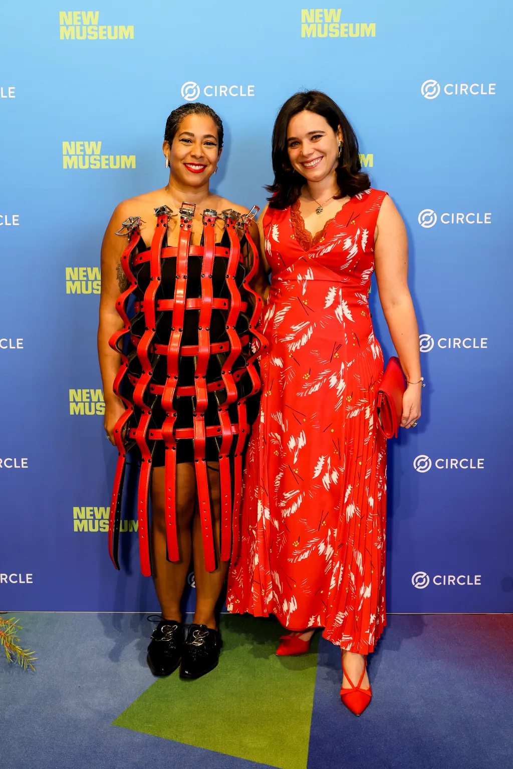 Image may contain Fashion Adult Person Clothing Dress Premiere Face and Head