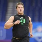 Caleb Lomu Patriots phone call draft night