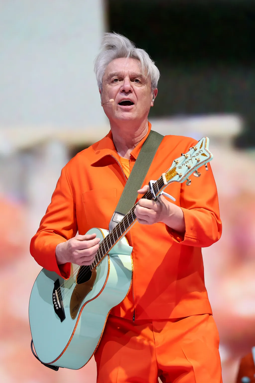 Image may contain David Byrne Guitar Musical Instrument Guitarist Leisure Activities Music Musician and Performer