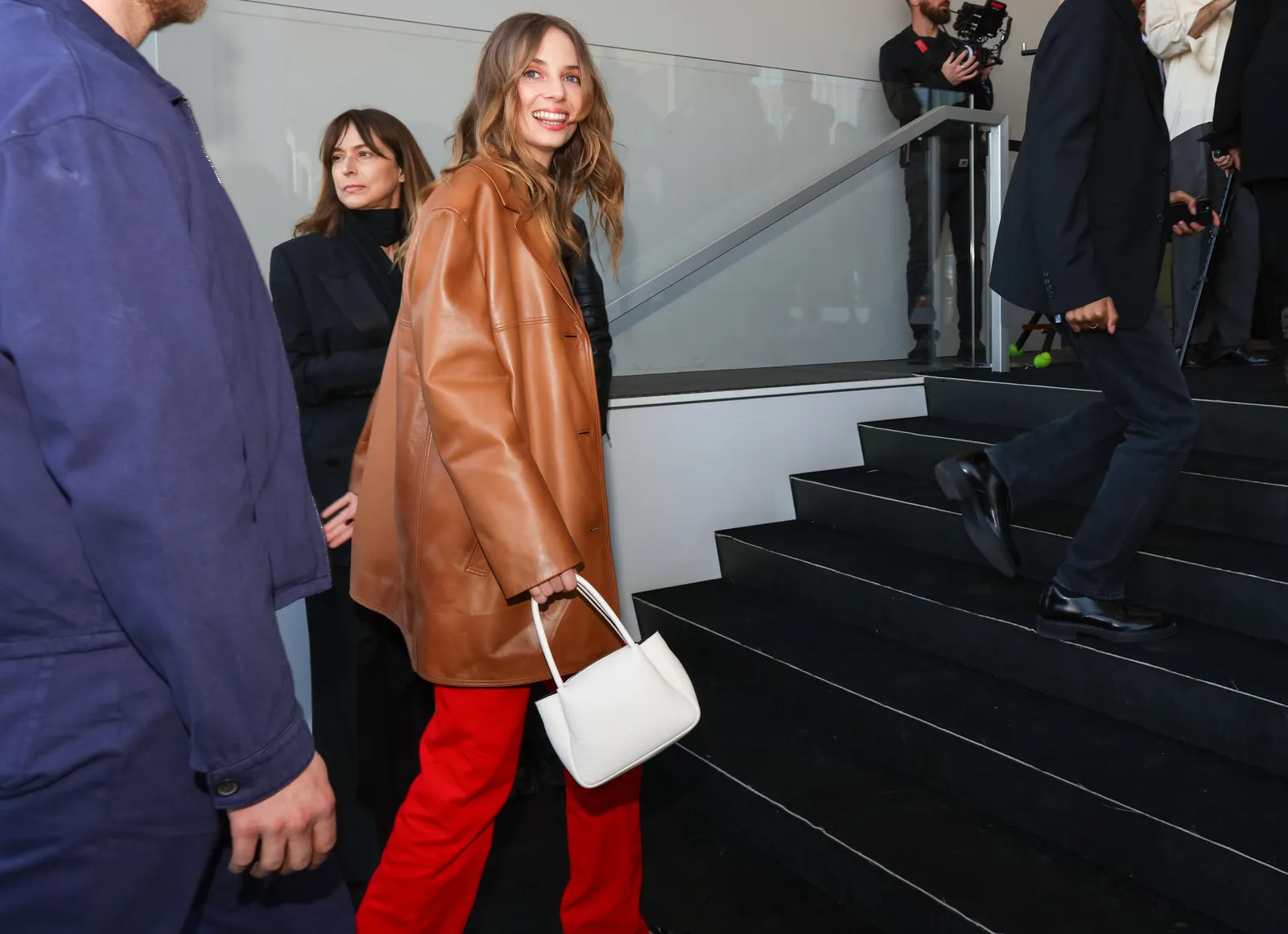 Image may contain Alexa Ray Joel Marc Newson Clothing Coat Accessories Bag Handbag Jacket Person and Adult