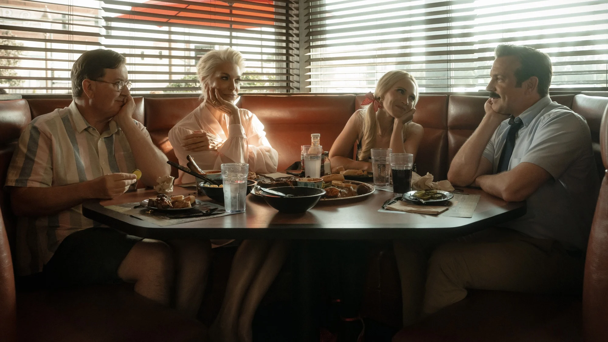 Jeremy Swift, Hannah Waddingham, Juno Temple, and Jason Sudeikis in "Ted Lasso."