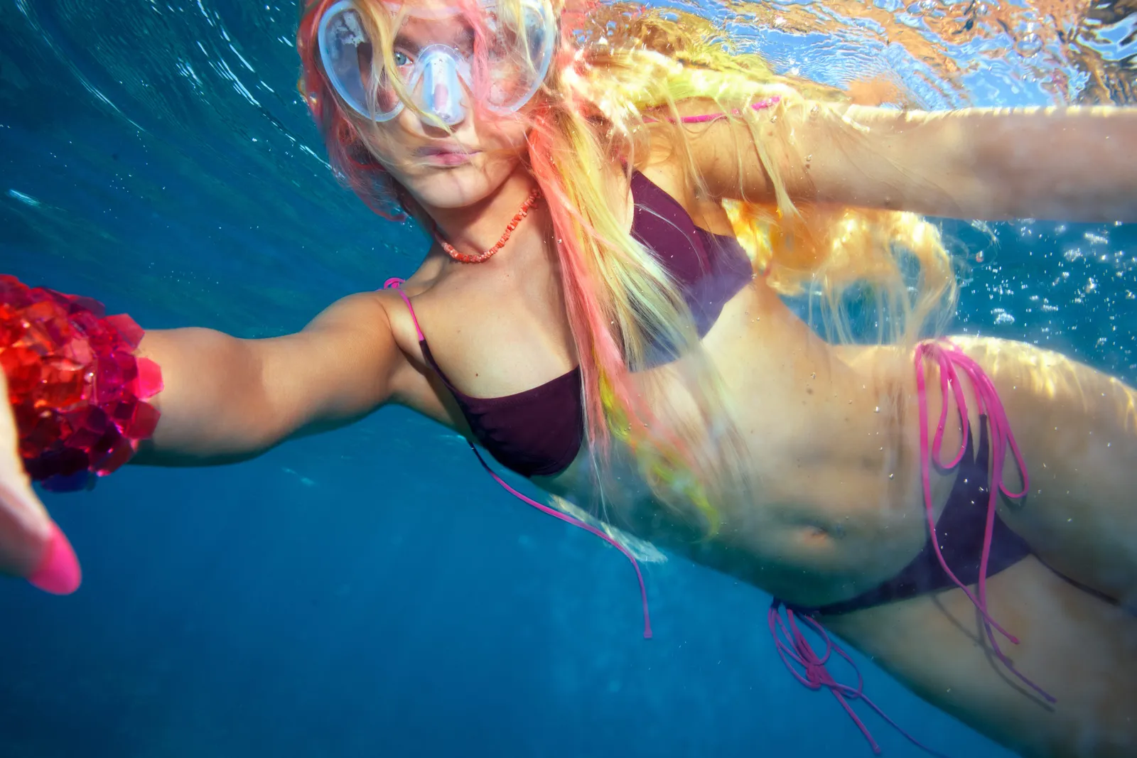Image may contain Leisure Activities Person Sport Swimming Water Water Sports Clothing Swimwear Face and Head