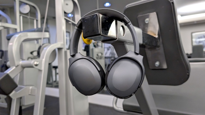 skullcandy headphones hanging on gym equipment