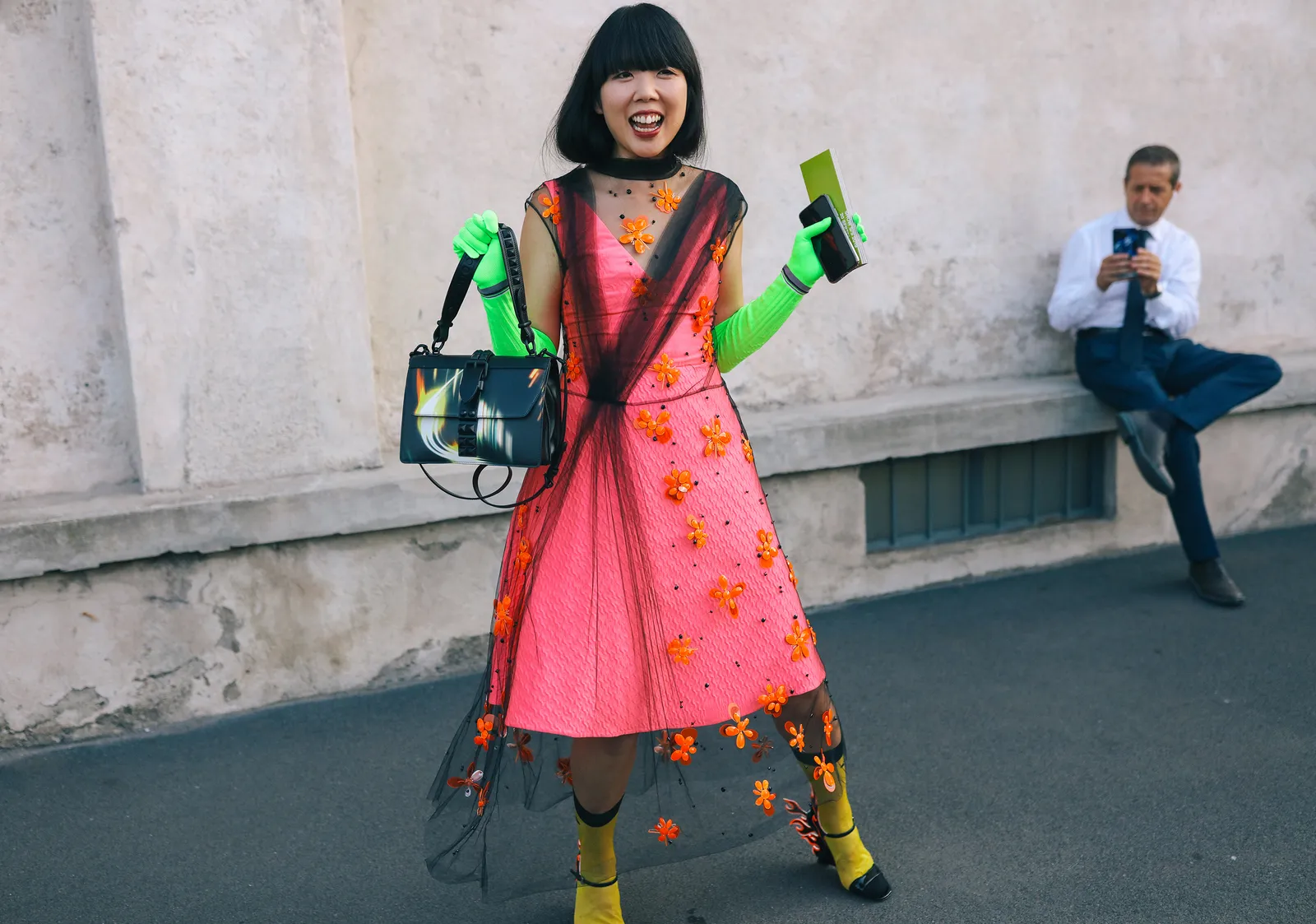 This image may contain Susanna Lau Clothing Apparel Human Person Footwear Shoe Pants Tarmac Asphalt and Costume