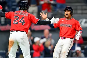 CLEVELAND, OHIO - APRIL 21: Chase DeLauter #24 and José Ramírez #11 of the Cleveland Guardians celebrate scoring during the eighth inning against the Houston Astros at Progressive Field on April 21, 2026 in Cleveland, Ohio. The Guardians defeated the Astros 5-8. (Photo by Jason Miller/Getty Images)