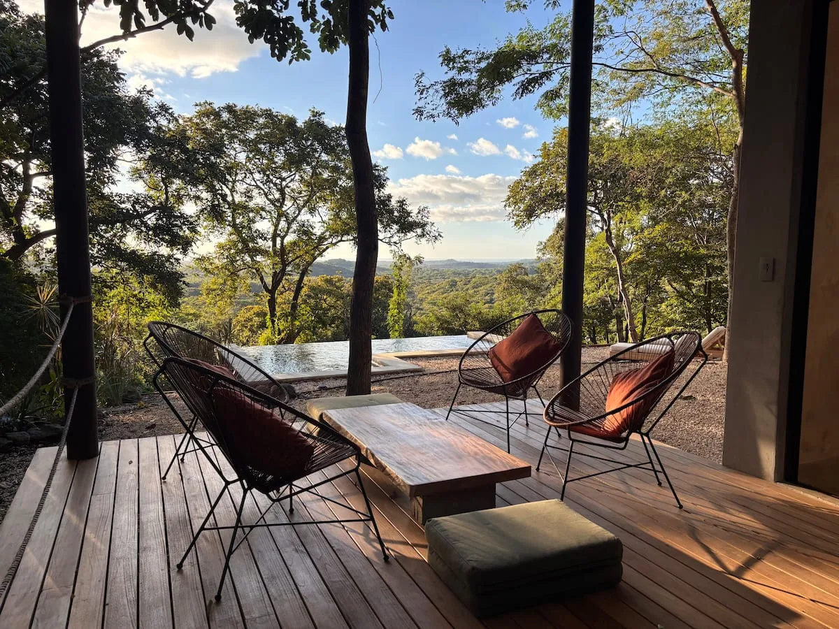 Image may contain Nature Outdoors Scenery Chair Furniture Lakefront Desk and Table