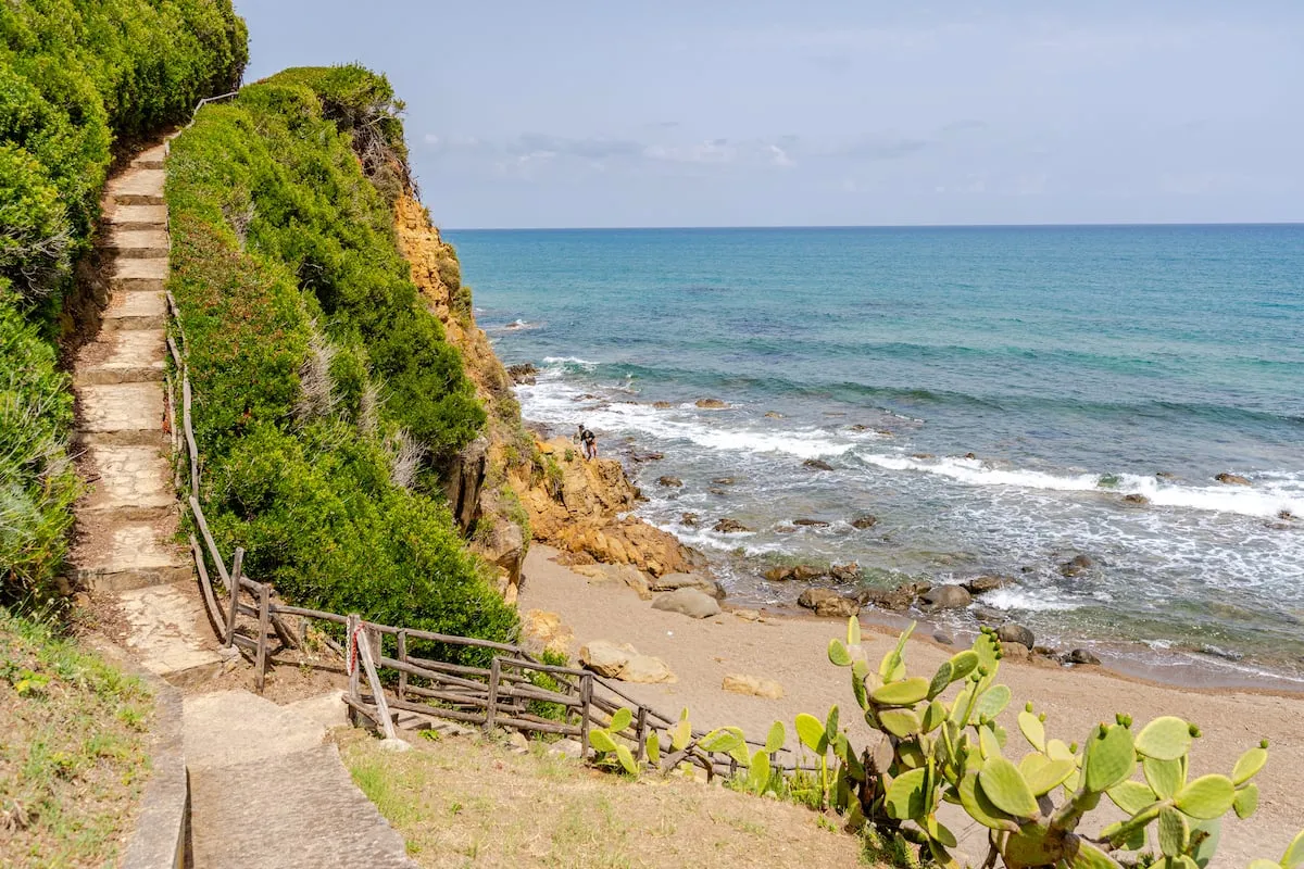 Image may contain Nature Outdoors Scenery Summer Path Sea Water Beach Coast Shoreline Horizon Sky and Trail