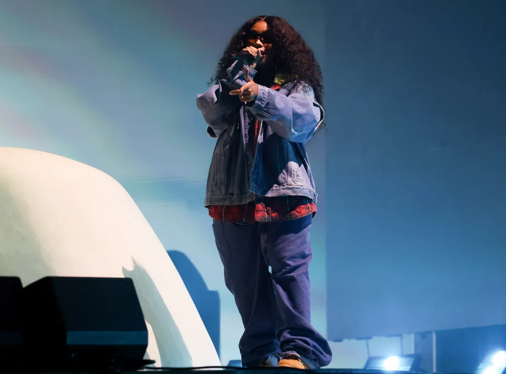 Image may contain SZA Performer Person Solo Performance Adult Clothing Coat and Jacket