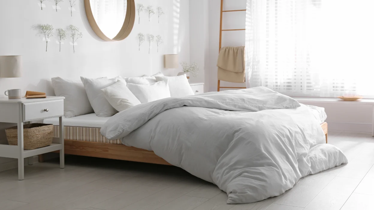 An Essentia mattress in a white room.