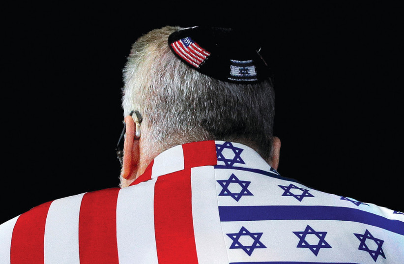 A member of the audience wears a United States-Israel themed custom suit during an AIPAC convention in Washington.