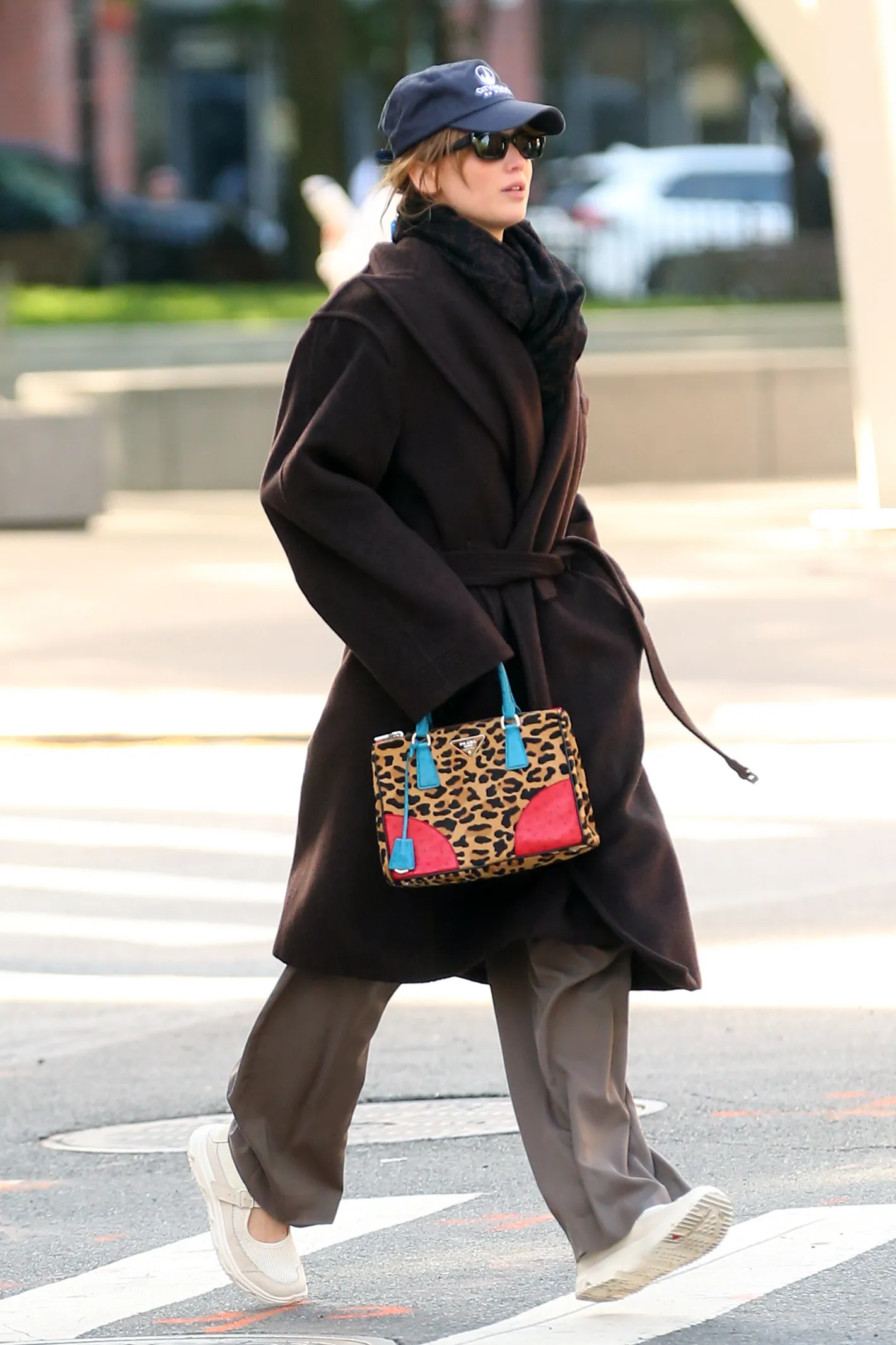 EXCLUSIVE Jennifer Lawrence rocks a colorful Prada Cavallino Struz double zip Galleria tote bag and Salomon RX Marie...