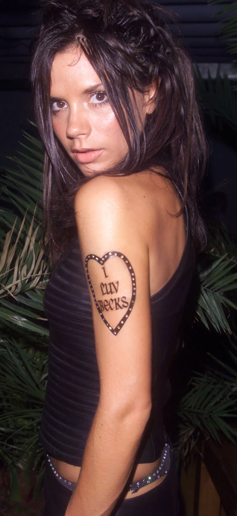 Image may contain Victoria Beckham Person Skin Tattoo and Adult. SAN ANTONIO IBIZA SPAIN  AUGUST 12 British pop singer...