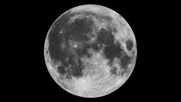 A detailed view of the full disk of the illuminated near side of the moon.