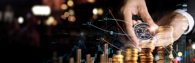 Businessman holding a navigation compass in hand and define investment direction and analysis growth stock market and banking, financial on global network. strategy and plan of invest marketing.