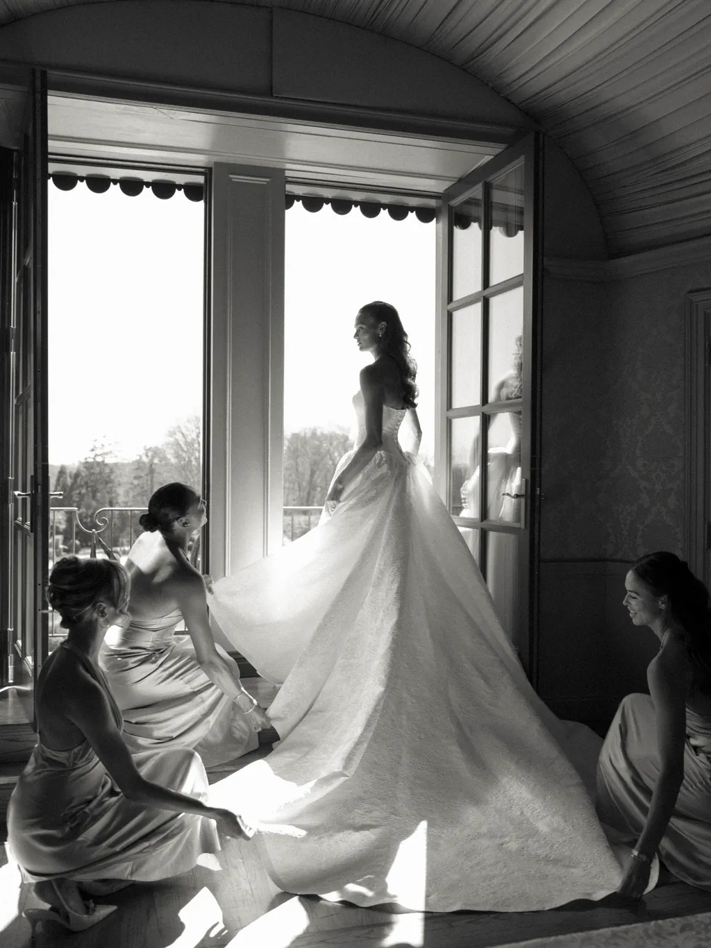 Image may contain Clothing Dress Fashion Formal Wear Gown Wedding Wedding Gown Face Head Person and Photography