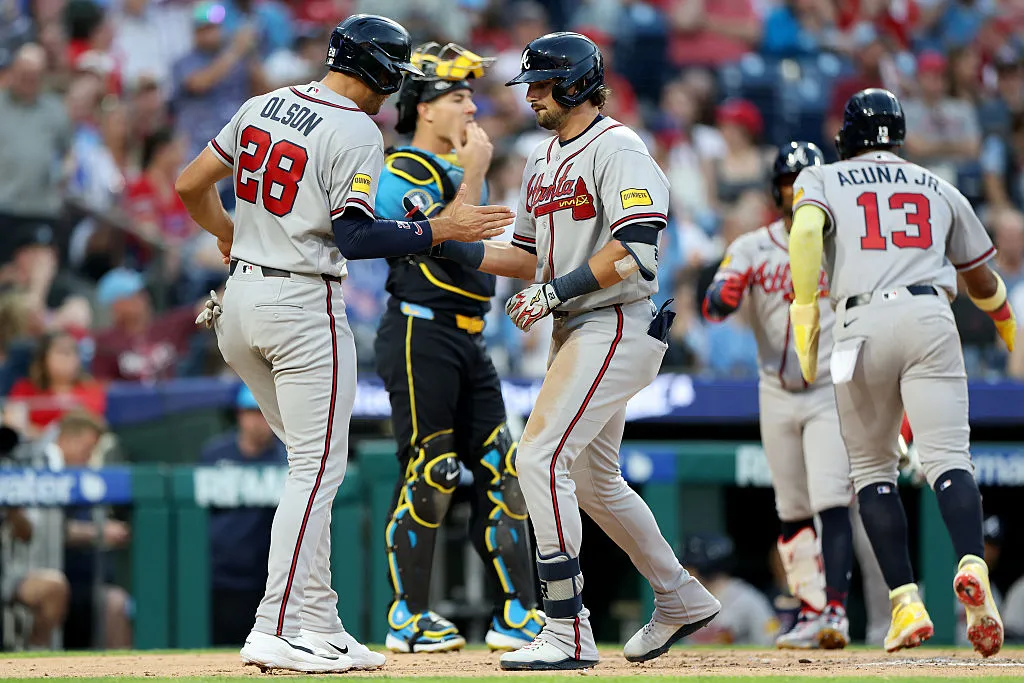PHILADELPHIA, PENNSYLVANIA - APRIL 17: Austin Riley #27 of the Atlanta Braves celebrates with Matt Olson #28 after hitting a three-run home run in the second inning against the Philadelphia Phillies at Citizens Bank Park on April 17, 2026 in Philadelphia, Pennsylvania. (Photo by Emilee Chinn/Getty Images)