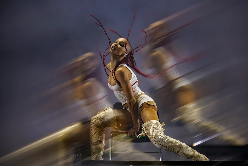Image may contain FKA Twigs Adult Person Performer Solo Performance Face and Head