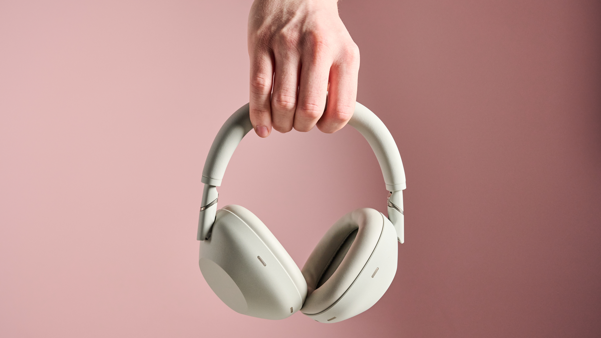 Person holding up the Sony WH-1000XM6