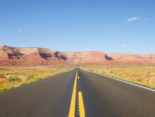 Road leading into the distance in the desert