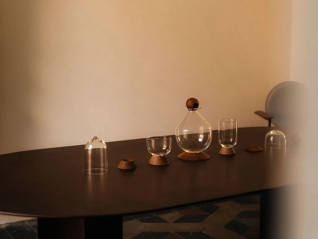 Image may contain Furniture Table Tabletop Cup and Lamp