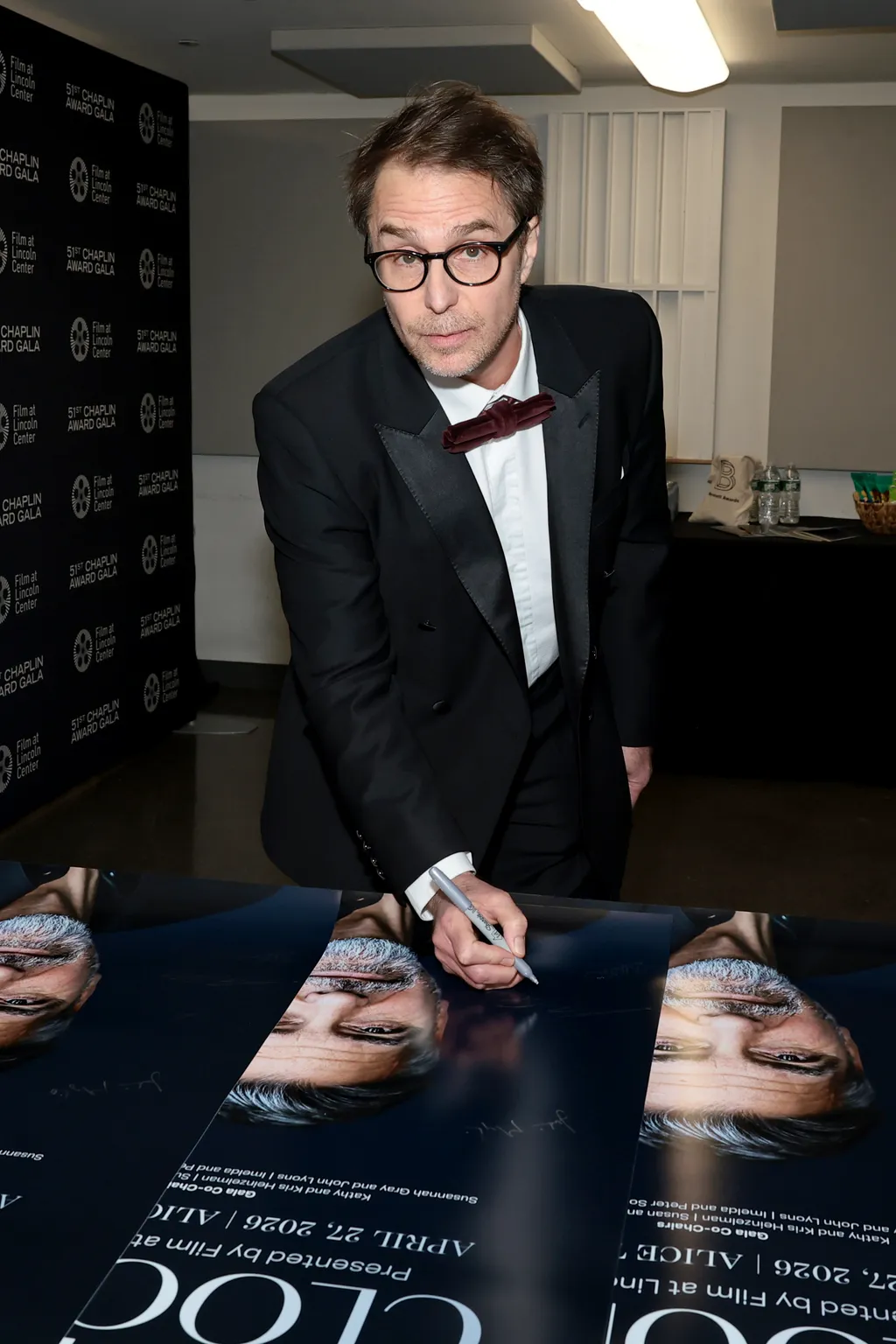 Image may contain George Clooney Sam Rockwell George Clooney Accessories Glasses Clothing Formal Wear and Suit