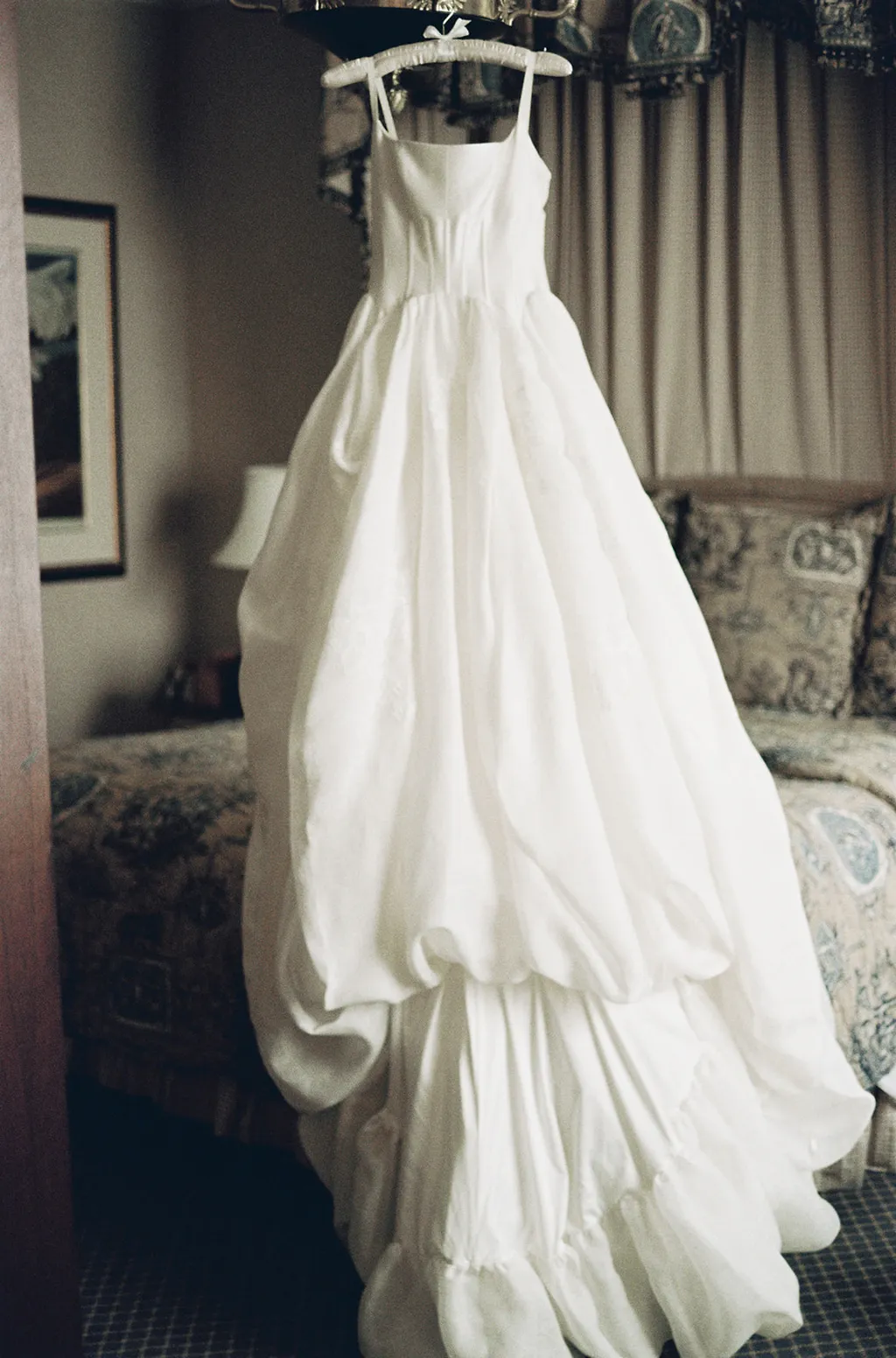 Image may contain Clothing Dress Fashion Formal Wear Gown Wedding Wedding Gown Adult and Person