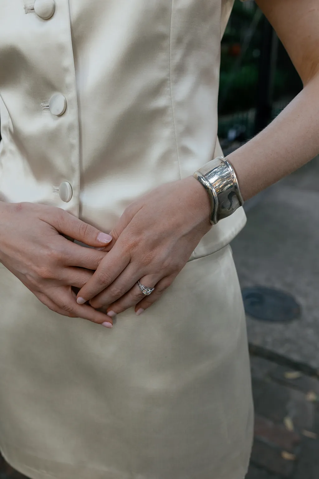 Image may contain Accessories Jewelry Ring Body Part Finger Hand Person Cuff Adult Clothing and Dress
