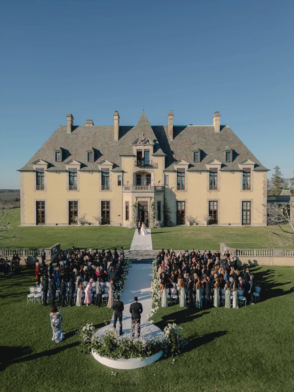 Image may contain Architecture Building Housing Person House Manor and College