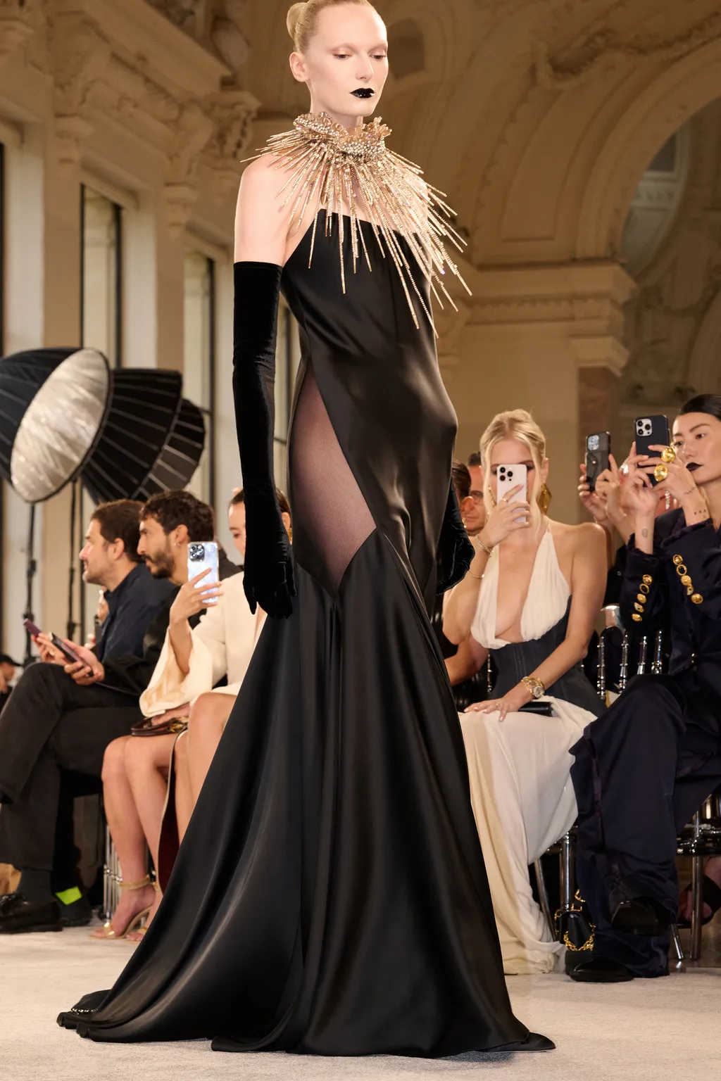 Image may contain Ray Scott Clothing Dress Evening Dress Formal Wear Adult Person Glove Footwear and High Heel