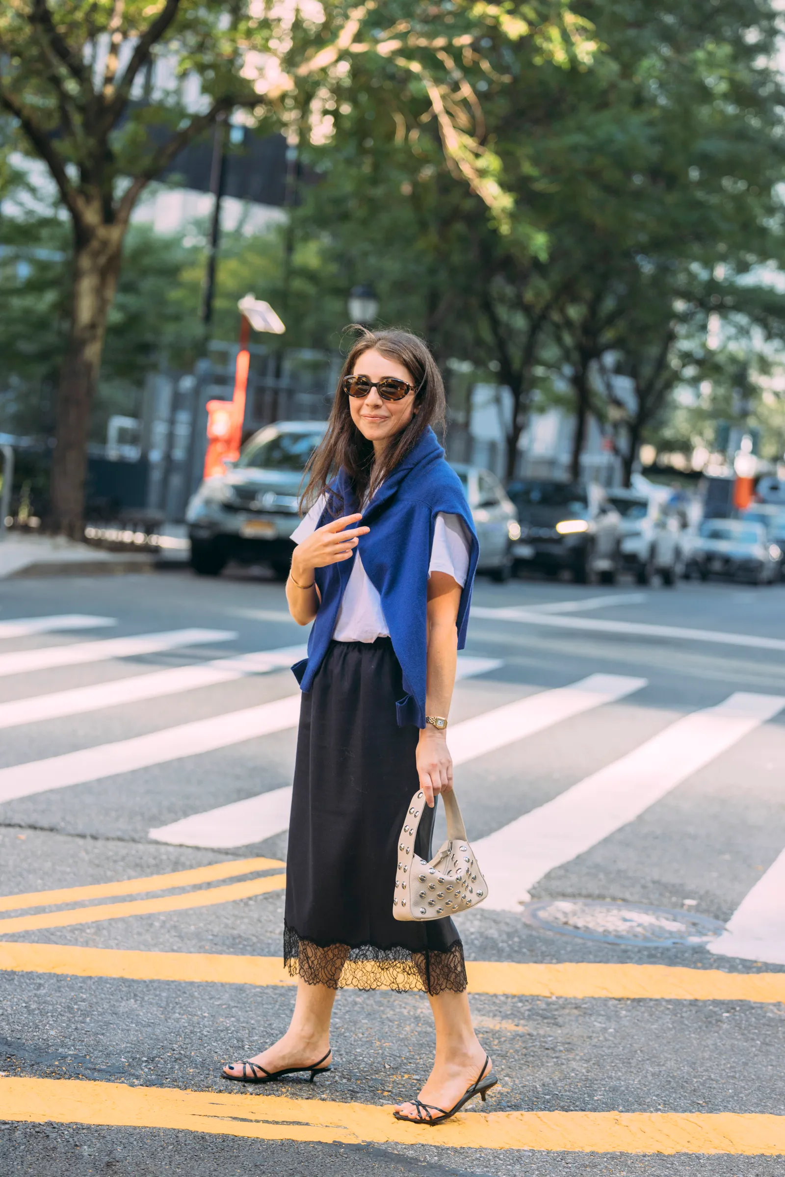 Image may contain Pedestrian Person Clothing Pants Sleeve Teen and Coat