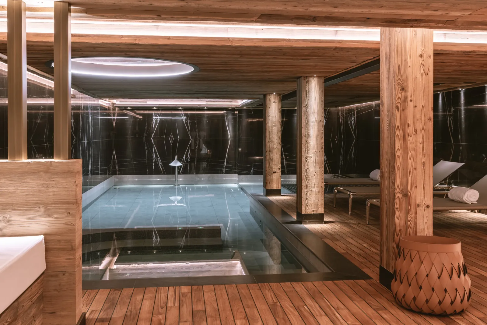 Image may contain Indoors Interior Design Pool Water Swimming Pool Tub and Floor