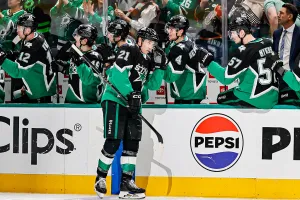 DALLAS, TX - APRIL 20: Dallas Stars left wing Jason Robertson (21) gets fist bumps after scoring a goal during the Stanley Cup Playoffs First Round game 2 between the Dallas Stars and the Minnesota Wild on April 20, 2026 at American Airlines Center in Dallas, TX. (Photo by Matthew Pearce/Icon Sportswire via Getty Images)