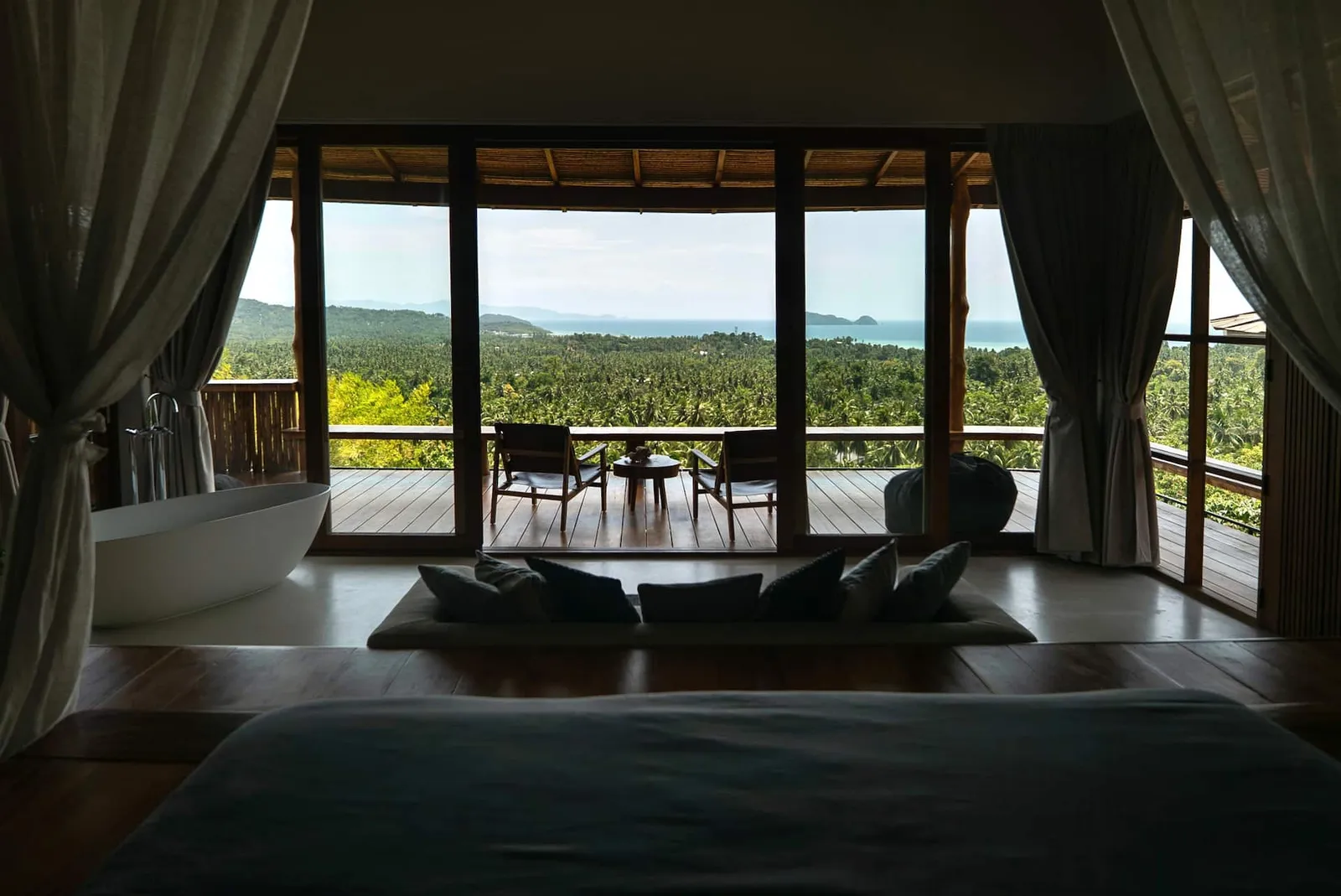 Image may contain Chair Furniture Nature Outdoors Scenery Architecture Building Hotel Resort and Indoors