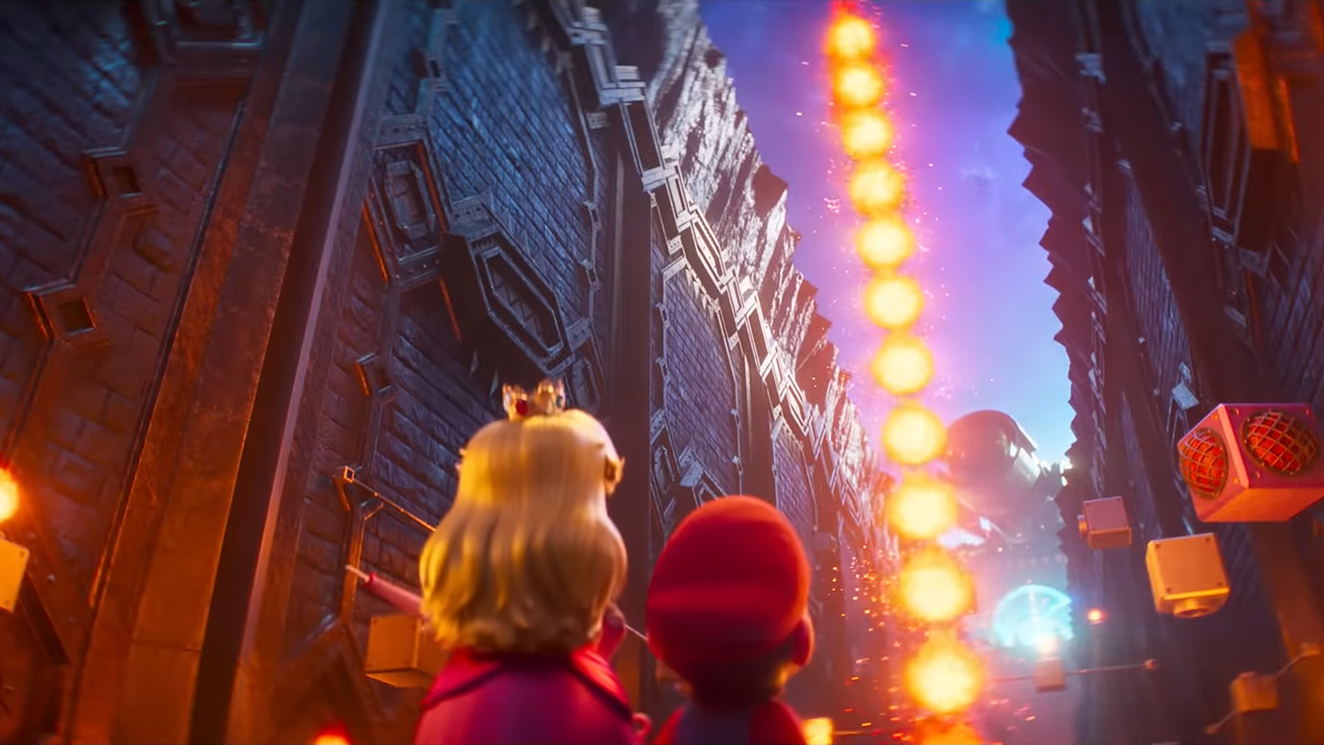 Characters from 'The Super Mario Bros. Movie' standing in a castle corridor as fireballs cascade down.