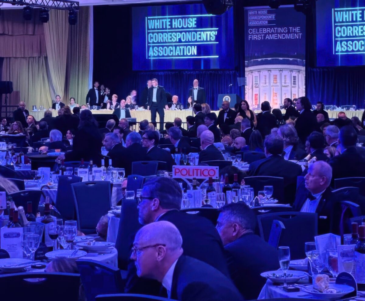 U.S. Secret Service agents respond near President Donald Trump and first lady Melania Trump during the White House Correspondents Dinner