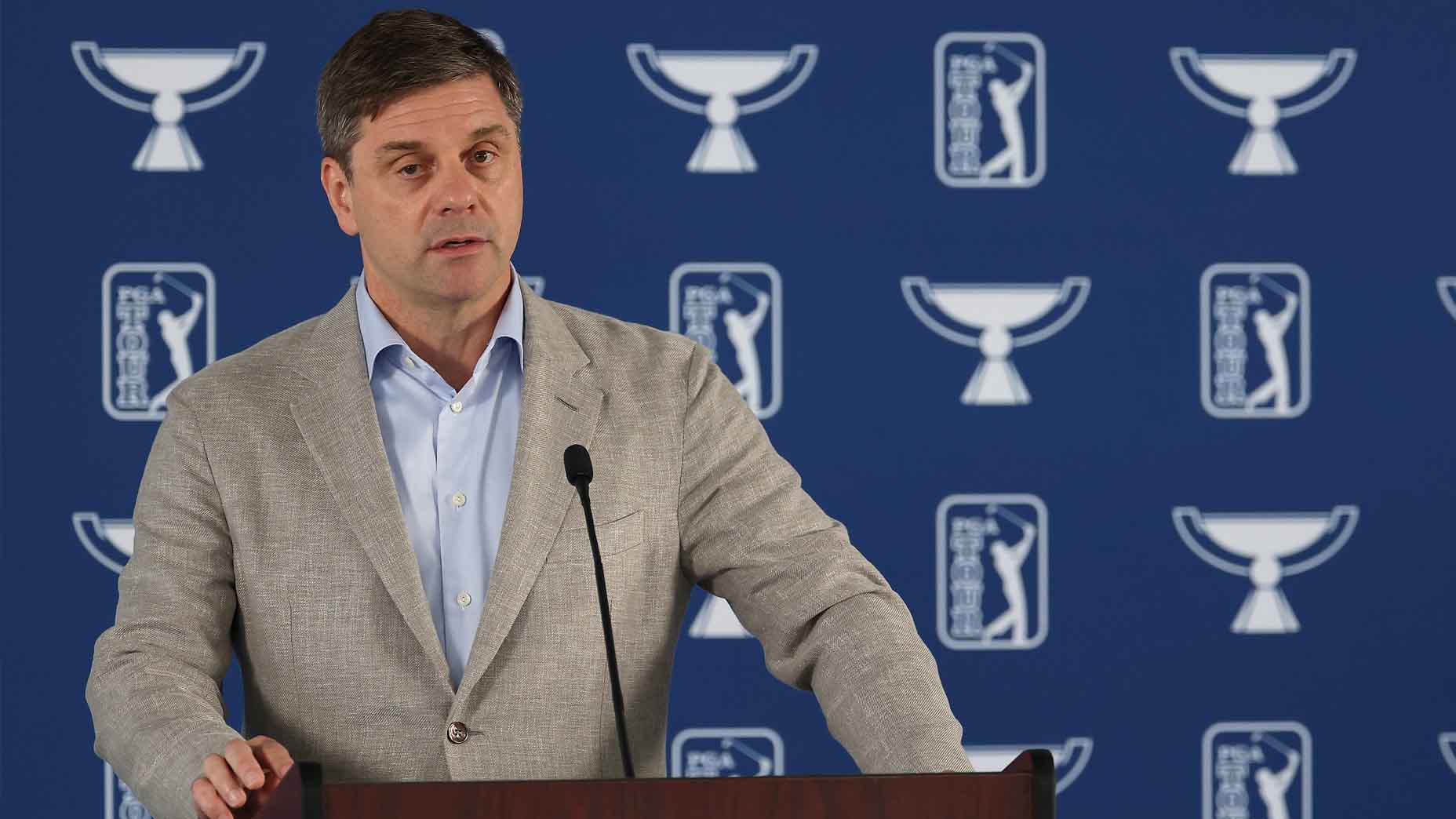 Brian Rolapp addresses the media at the Tour Championship