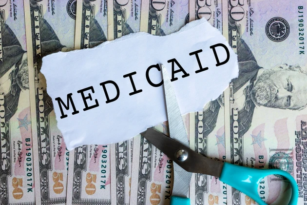 Medicaid Healthcare Assistance Concept With Money Background