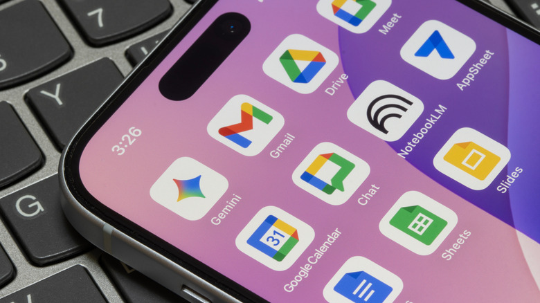 A phone open showing different Google apps