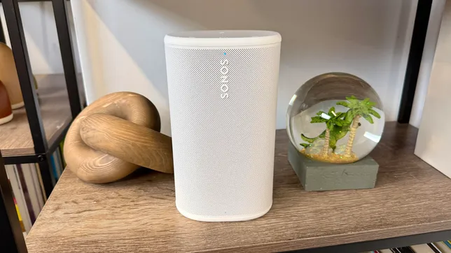 The Sonos play portable speaker in white sitting on a shelf