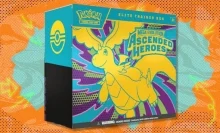 The Pokémon TCG: Mega Evolution — Ascended Heroes Elite Trainer Box on a green and orange background