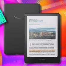 An Amazon Kindle Colorsoft on a colorful background