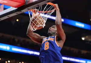 ATLANTA, GEORGIA - APRIL 23: Og Anunoby #8 of the New York Knicks dunks against the Atlanta Hawks during the first quarter of game three of the Eastern Conference first round playoffs at State Farm Arena on April 23, 2026 in Atlanta, Georgia. NOTE TO USER: User expressly acknowledges and agrees that, by downloading and or using this photograph, User is consenting to the terms and conditions of the Getty Images License Agreement. (Photo by Kevin C. Cox/Getty Images)