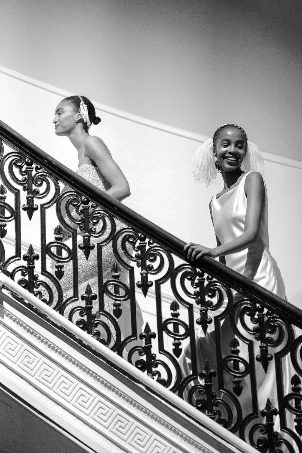 Image may contain Handrail Railing Clothing Dress Adult Person Wedding Architecture Building House and Housing