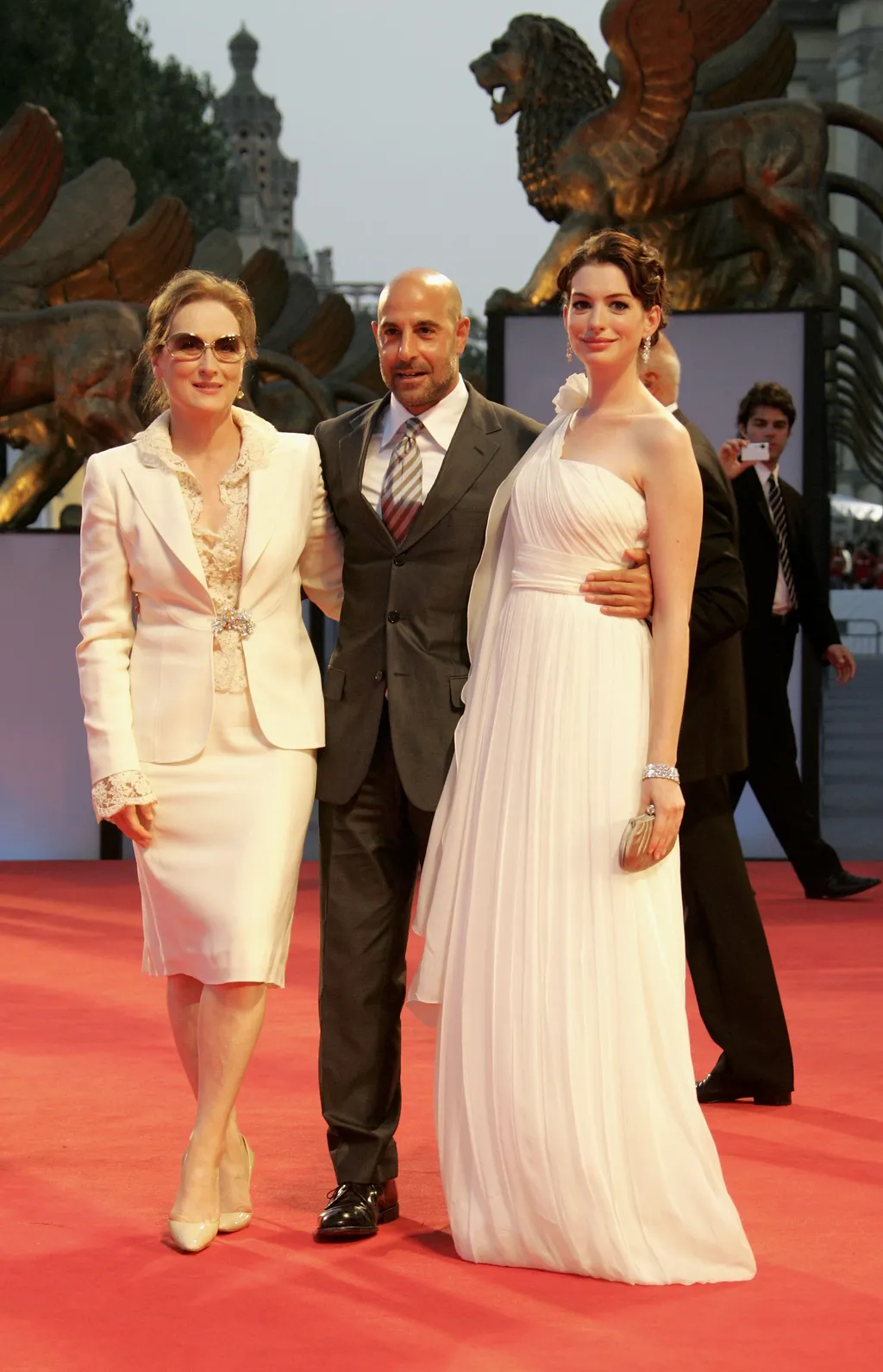 Image may contain Meryl Streep Stanley Tucci Anne Hathaway Fashion Blazer Clothing Coat Jacket Adult and Person