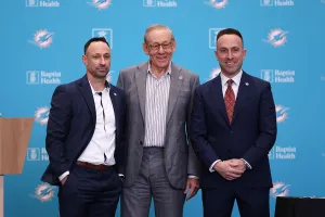 MIAMI GARDENS, FL - JANUARY 22: Miami Dolphins owner Stephen Ross poses for a photo with new Miami Dolphins general manager Jon-Eric Sullivan and new Miami Dolphins head coach Jeff Hafley during the Miami Dolphins press conference on Thursday, January 22, 2026 at Baptist Health Training Center in Miami Gardens, FL.