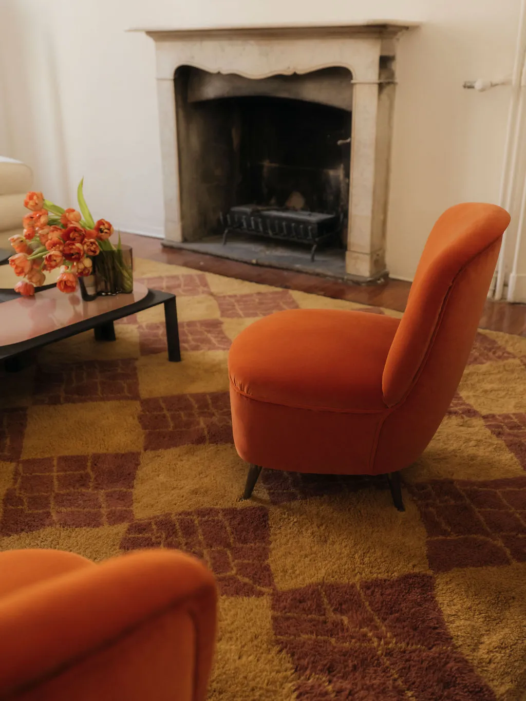 Image may contain Furniture Fireplace Indoors and Chair