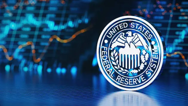 Metallic Federal Reserve System Over Financial Chart Background